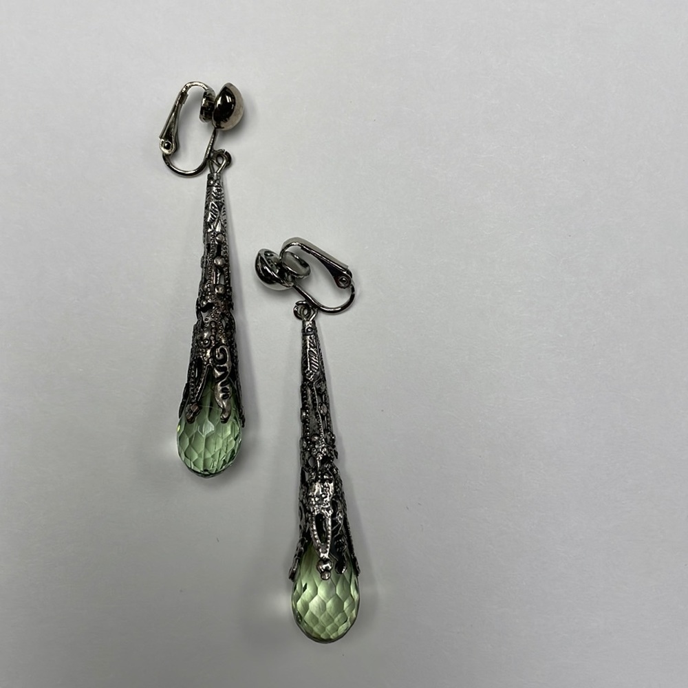 Steampunk fairy clip on earrings. Stone is a beautiful fairy green.